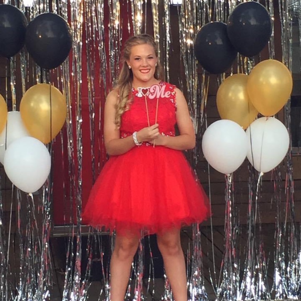 It’s homecoming season.  Worn once. Like new!